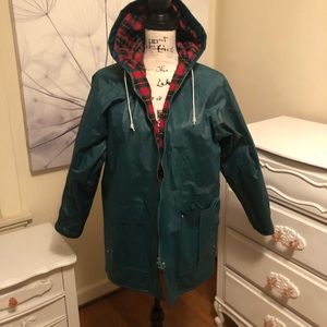 Vintage dark green misty harbor raincoat